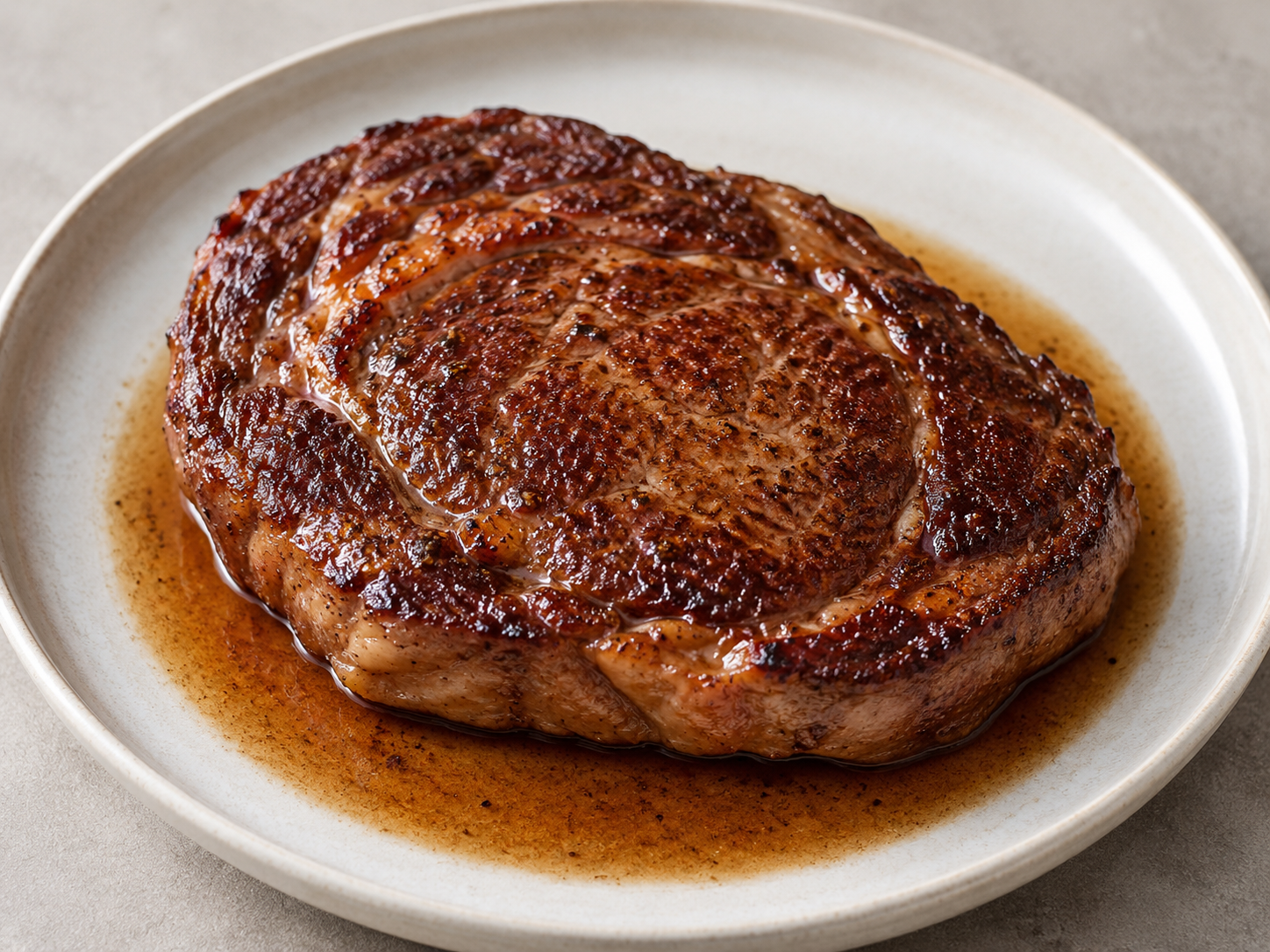 A pan-seared steak, seared and rested