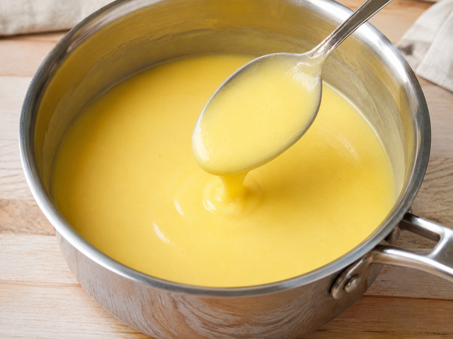 A silky, emulsified beurre monté being whisked